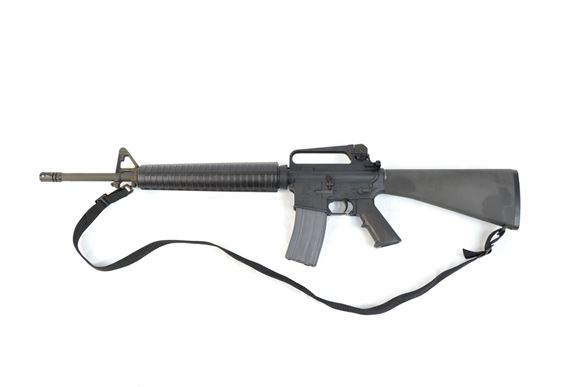 Picture of Used Bushmaster XM15-E2S Semi-Auto .223, 20'' Barrel, A2 Style Fixed Stock & Carry Handle, One Mag, Very Good Condition