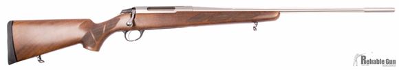 Picture of Pre Owned Unfired Tikka T3 Hunter Stainless Fluted, 300 Win Mag, Bolt Action, Walnut Stock, 24'' Stainless Fluted Barrel, Unfired, excellent condition.