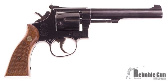 Picture of Used Smith & Wesson 17-4, 22 LR 6 Shot Revolver, Wood Grips, Gloss Blue, Good Condition Stamped B.C. AUX.