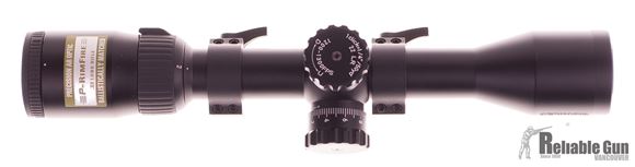 Picture of Used Nikon P-Rimfire 2-7x32mm Scope, Niko-Plex Reticle, Includes Leupold QRW 1" Medium Rings, Very Good Condition