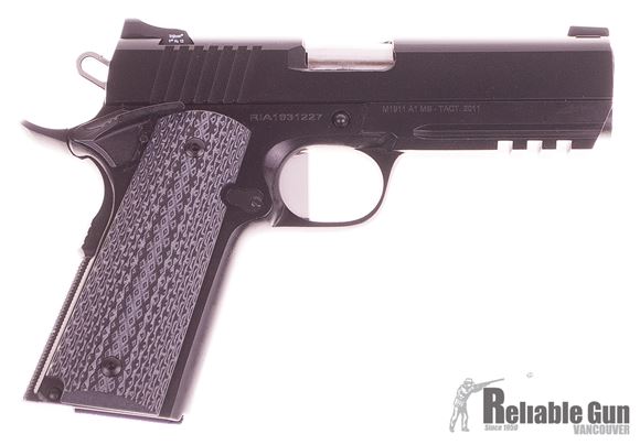 Picture of Used Rock Island Armory (RIA) 1911A1 Tactical Semi-Auto Pistol - 9mm, 4.25" Barrel, With Trijicon Sights, VZ Grips, Upgraded Trigger, One Mag & Original Box, Excellent Condition