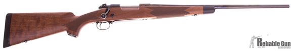 Picture of Used Winchester Model 70 Super Grade Bolt Action Rifle - 308 Win, 22", High Gloss Blued, Satin Grade IV/V Walnut Stock w/Shadowline Cheekpiece, Jeweled Bolt Body, M.O.A. Trigger System, Pre-'64 action, 5rds, Like New (never Fired) Excellent Condition no