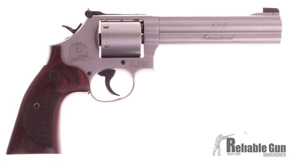 Picture of Used Smith & Wesson 686-6 International Double-Action .357 Mag, 6" Barrel, Stainless With Rosewood Handle, With Original Box, Excellent Condition