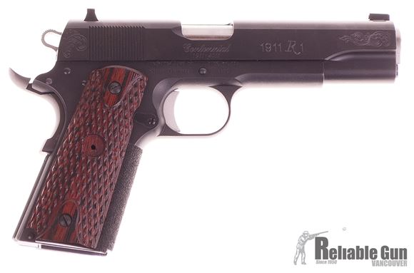 Picture of Used Remington 1911 R1 Centennial Semi-Auto .45ACP, With 2 Mags & Original Box, Grip Medallion Missing, Otherwise Good Condition