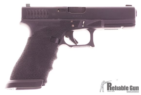 Picture of Used Glock 22 RTF2, 40 S&W, Stippled Frame Oversize Mag Release, Zev Takedown Lever, Zev Slide stop, Oversize Magloc Magwell , Tritium Night Sights, Stainless Guide Rod, Comes With 9mm Storm Lake Ported Barrel, 3 Magazines, Good Condition