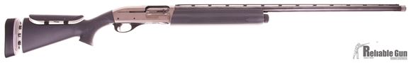 Picture of Used Remington Model 1100 Competition Synthetic Semi-Auto Shotgun - 12Ga, 2-3/4", 30", High-Gloss Blued, Polished Nickel-Teflon Receiver, Carbon Graphite Dip Synthetic Stock w/Adjustable Comb & Cast & w/Recoil Reduction, 5 Extended Chokes Chokes, Birchwo