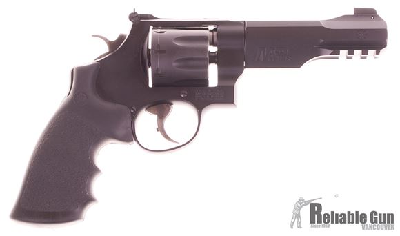 Picture of Used Smith & Wesson M327 M&P R8 357 Mag Revolver - w/Original Box, 2 Premium Leather Holster, 1 Box of target Ammo, 2 Boxes of Premium Ammo. Good Condition