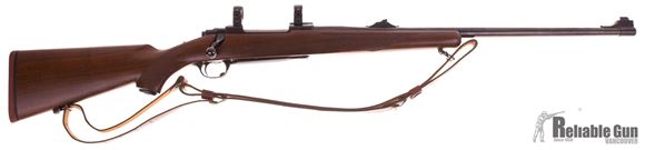 Picture of Used Ruger M77 .338 Win Mag Bolt Action Rifle, With Sights, Walnut Stock, 1" Ruger Rings, Leather Sling, Some Minor Rust Spots Otherwise Good Condition