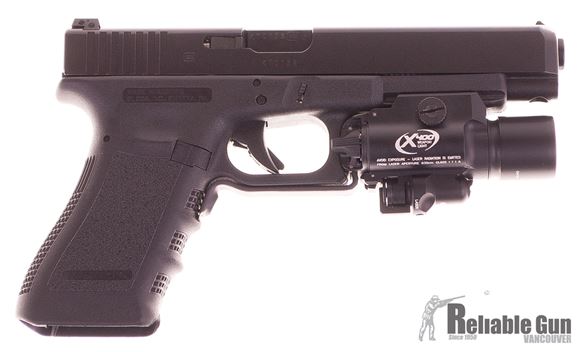 Picture of Used Glock 35 Gen 3 Semi Auto Pistol, 40 S&W, Black, Adjustable Rear Sight, Surefire X400 Light Laser Combo, 10 magazines, Holster, Very Good Condition, No Box