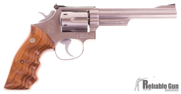 Picture of Used Smith & Wesson Model 66-1 357 Magnum Revolver, 6'' Stainless, 6 Shot, Deluxe Wood Grips With Finger Grooves, Adjustable Rear Sight, Leather Holster, Very Good Condition