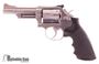 Picture of Used Smith & Wesson Model 66-1 Double-Action 357 Mag, 4" Barrel, Stainless, Hogue Grip, With Leather Holster & 2 Speed Loaders, Good Condition