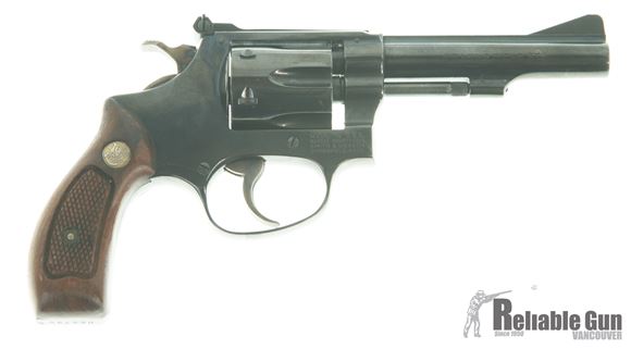 Picture of Used Smith & Wesson Model 34-1 Revolver, .22 Lr, 6- Shot, Blued, Wood Grip, Holster, Good Condition