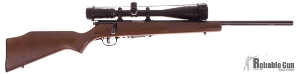 Picture of Used Savage 93R17, Bolt Action Rifle, 17 HMR, Wood Stock, 21'' Heavy Barrel, Accu Trigger, Tasco 6-24 Varmint Scope, 1 Magazine, Good Condition