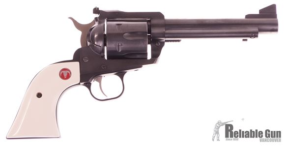 Picture of Used Ruger Blackhawk Convertable Single-Action 45 Colt, 5.5" Barrel, Blued, Spare 45 ACP Cylinder, Faux Ivory Grips, With Original Grips & Box, Excellent Condition