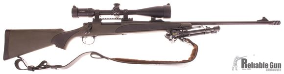 Picture of Used Remington 700 XCR II Bolt Action Rifle - 375 H&H Mag, 24" Barrel w/Sights & Muzzle Brake, Black TriNite, Overmolded Stock, Zeiss Conquest 6.5-20 x 50 Scope, Leather Sling, Caldwell Bipod, Excellent Condition