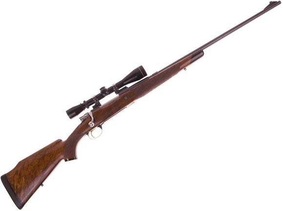 Picture of Used Custom Rifle .264 Win Mag Bolt Action Rifle, 26", Mauser Style Engraved FN Browning Receiver And  Engraved Bottom Metal, Winchester Barrel, Walnut Stock with End Cap, Leupold Vari-X II 3-9x40, Good Condition