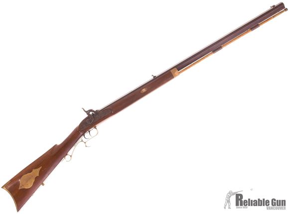 Picture of Used Thompson Center "Hawken Rifle" w/2 Barrels 32'' Octagon 54 Cal, 28'' Octagon 50Cal  .Blackpowder, Wood Stock, Double Set Trigger, Fair Condition
