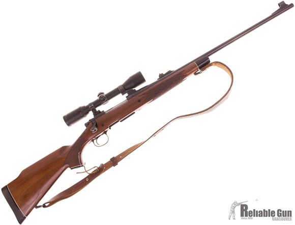 Picture of Used Remington 700 BDL DM 300 Win Mag Bolt Action Rifle, 24'' Barrel w/Sights, Walnut Stock, Zeiss Diavari C 3-9x36 MC Scope, EAW Swing off Mounts, Leather Sling, 1 Magazine, Very Good Condition