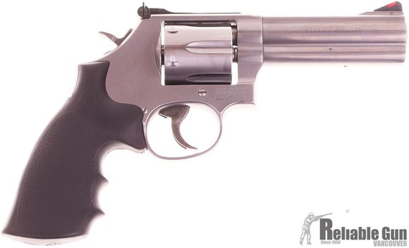 Picture of Used Smith & Wesson (S&W) Model 686-6 DA/SA Revolver - 357 Mag, 4-1/4", Satin Stainless Steel Frame & Cylinder, Medium Frame (L), Synthetic Grip, 6rds, Red Ramp Front & Adjustable White Outline Rear Sights. As new condition.
