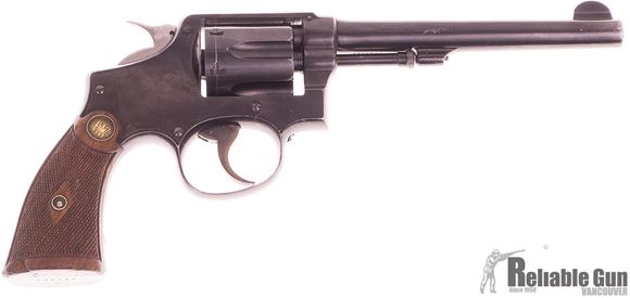 Picture of Used Smith & Wesson Model 10 Revolver, 38 S&W Special, Standard Barrel 6'', Wood Grips Chipped At Bottom, Hammer Rounded and Polished, Leather Holster, Fair Condition
