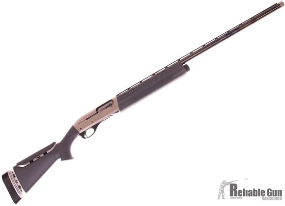 Picture of Used Remington Model 1100 Competition Synthetic Semi-Auto Shotgun - 12Ga, 2-3/4", 30", High-Gloss Blued, Polished Nickel-Teflon Receiver, Carbon Graphite Dip Synthetic Stock w/Adjustable Comb & Cast & w/Recoil Reduction, 5 Extended Chokes Chokes, Birchwo