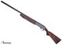 Picture of Used Remington 1100 G3 Semi Auto Shotgun, 12-Gauge, 28'' Barrel, Walnut Stock, 5 Chokes, Original Case (1 Broken Latch), (Crack in the Finish By The Mag Cap) Very Good Condition