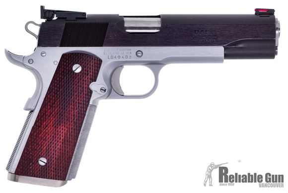 Picture of Used Les Baer 'Boss' 1911 Two Tone, 45 Acp, 5'',  Hard Chrome Frame w/ Blued Slide, Adjustable Rear Sight Fiber Optic Front,  Checkered Rosewood Grips, Magwell, 1 Magazine, Excellent Condition